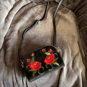 Black long strap bag with roses
